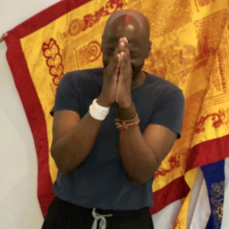 Melvin Horton with hands in prayer